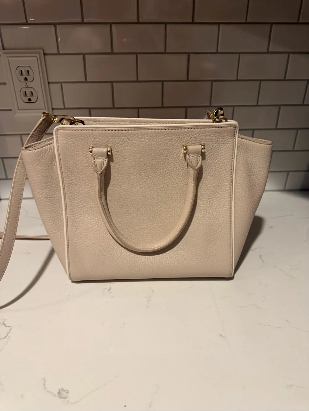 kate spade pebble leather satchel in light cream with tassel